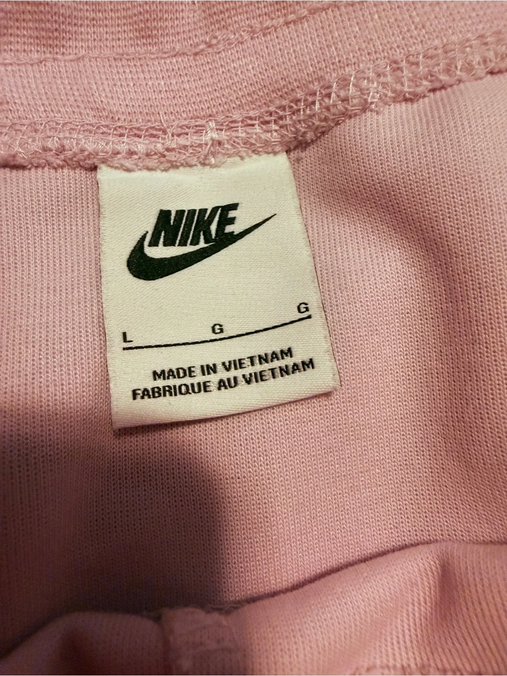 Nike Women’s Light Pink Full-Zip Tech sweatsuit